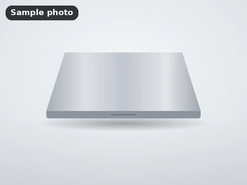 Sample photo: a closed silver laptop with a blank lid. Not Platinum Prints work.