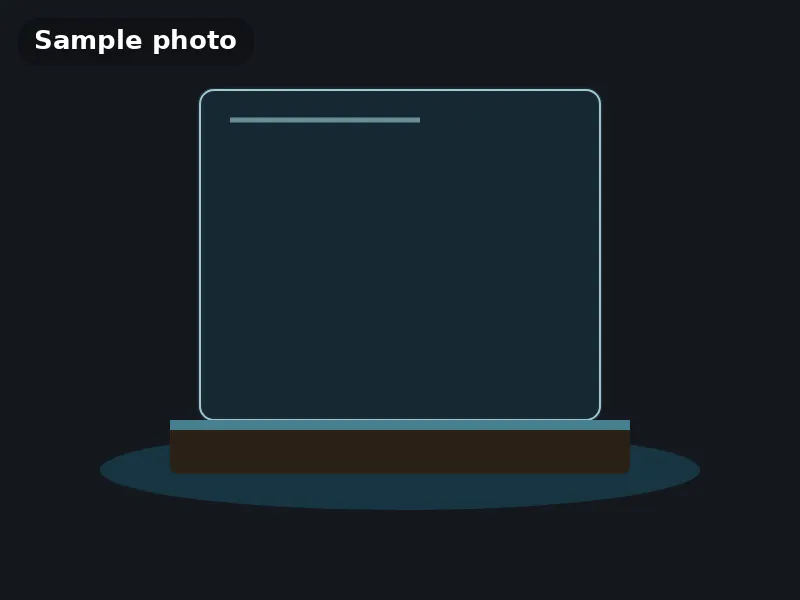 Sample photo: a blank edge-lit acrylic panel glowing blue on a wooden base. Not Platinum Prints work.