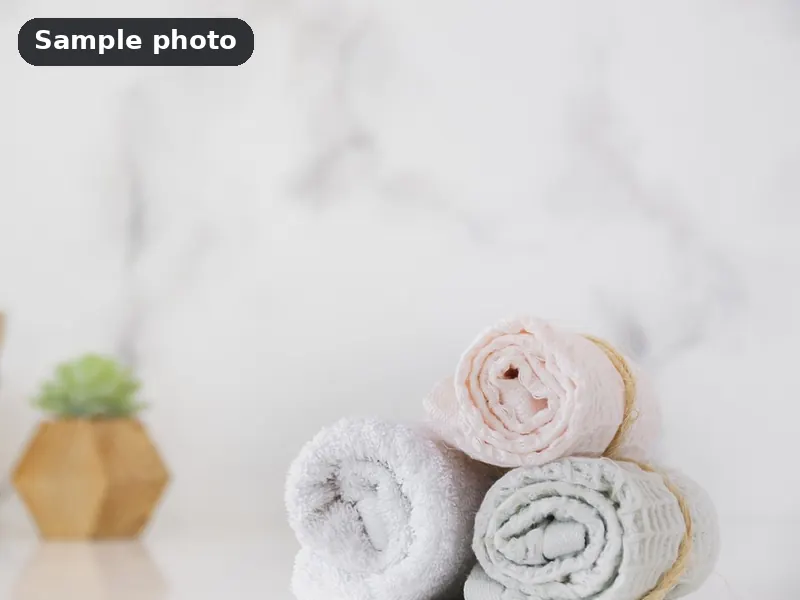 Sample photo: rolled plain towels on a counter. Not Platinum Prints work.